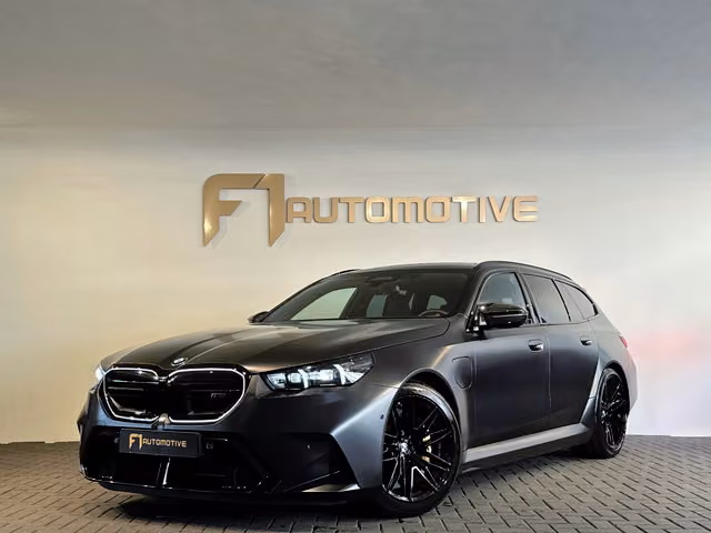 BMW M5 5-serie Touring Pano|Keramisch|B&W|HuD|Carbon|M Drivers